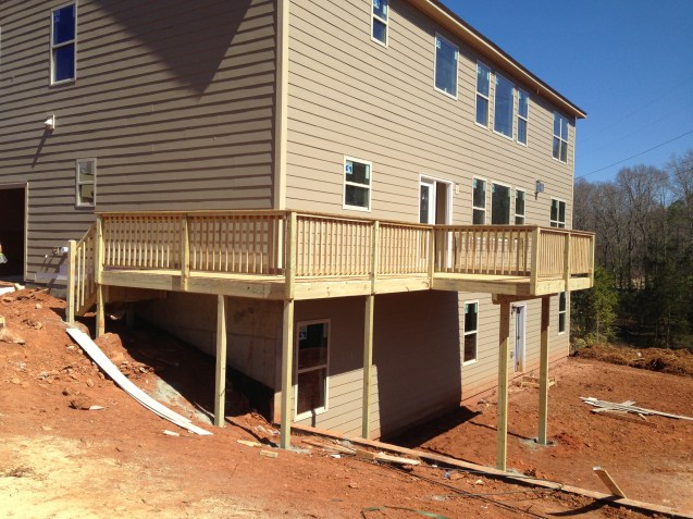 10x12 wood deck with handrail and wrap around walkway