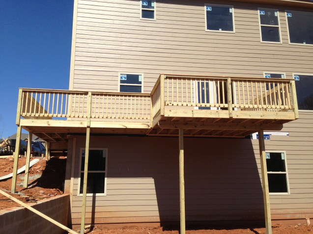 10x12 wood deck with handrail and wrap around walkway