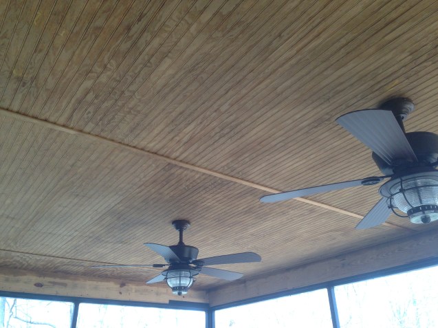 Deck with screened porch, bead board ceilings, and aluminum pickets. 