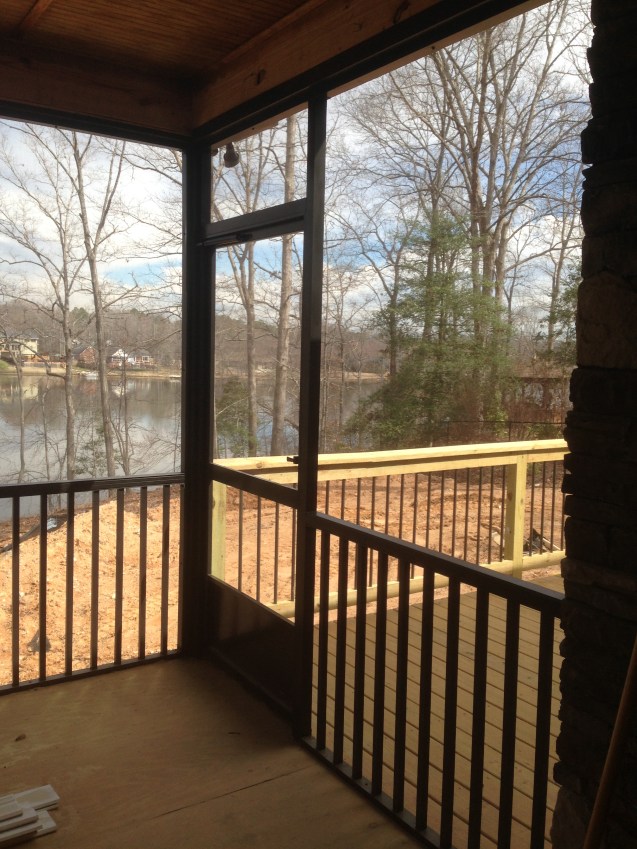 Deck with screened porch, bead board ceilings, and aluminum pickets. 